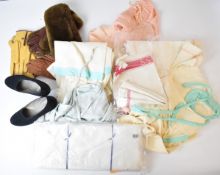 Collection of women's clothing with CC41 WW2 utility clothing labels including pink top,