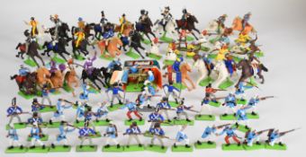 Seventy-four Britains Deetail plastic toy soldiers on metal bases to include British Waterloo,