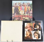 Three Beatles LPs comprising the The Beatles (White Album) (PMC 7067/8) embossed The Beatles and