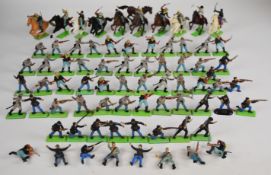 Over seventy Britains Deetail 'American Civil War' plastic toy soldiers on metal bases, to include