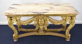 William Kent or similar gilt George II centre table, the variegated marble top having moulded