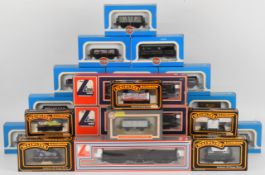 Twenty-seven 00 gauge model railway goods wagons, manufacturers include Hornby, Lima, Airfix and