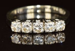An 18k white gold ring set with five diamonds, each approximately 0.1ct, 3.2g, size H/I