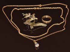 Two 9ct gold chains (4.6g), 9ct gold gold eternity ring (1.3g) and silver brooch in the form of four