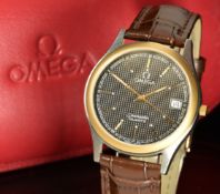 Omega Seamaster gentleman's wristwatch ref. 1425 with date aperture, gold hands and baton hour