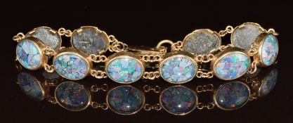A 9ct gold bracelet set with micro mosaic opal, 11.6g, 18cm