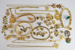 A collection of jewellery including 1970's necklaces, two Sphinx necklaces, tribal style necklace