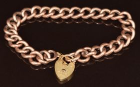A 9ct rose gold curb link bracelet with more modern heart clasp, 12.5g, 20cm