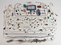 Twenty-six silver pendants including agate, amber, opal triplet, etc, ten silver chains, tanzanite