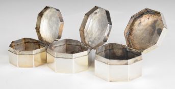 Three Chinese, Burmese or similar octagonal silver trinket pots, width of largest 6cm, weight of all
