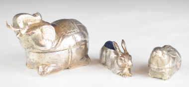 Three Turkish, Burmese or similar novelty trinket pots and pin cushions formed as an elephant and