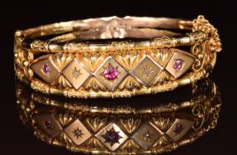 A c1900 9ct gold bangle set with paste and rose cut diamonds, 14.5g