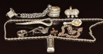 A collection of jewellery including silver curb link bracelet, silver ring, silver ingot pendant,