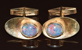A pair of 9ct gold cufflinks set with opal doublets, 13.2g