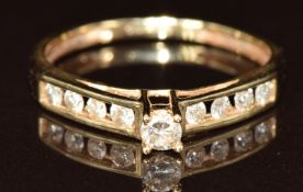 A 14k gold ring set with diamonds, 1.7g, size L