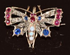 Victorian 9ct gold metamorphic brooch in the form of a butterfly set with rubies, sapphires, opals