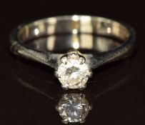 A 18ct white gold ring set with a round cut diamond of approximately 0.25ct, 2.4g, size H