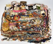 A collection of costume jewellery including vintage earrings, vintage brooches, agate and beaded