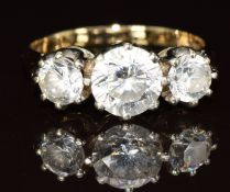 A 9ct gold ring set with three cubic zirconia, 4g, size N