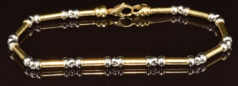 An 18ct gold bi-coloured bracelet, 20.5g, 21cm