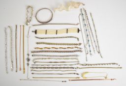 Thirty four silver bracelets including amethyst, pearl, topaz, peridot, cubic zirconia, etc , 195g