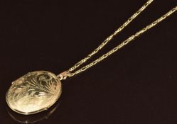 A 9ct gold locket with scrolling decoration (3 x 2.3cm) and chain, 9g, 60cm