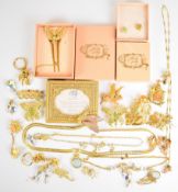 A collection of Kirks Folly jewellery including seven brooches, two key rings, three pairs of