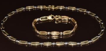 A 9ct gold bi-coloured necklace and matching bracelet, 27g, 43.5cm, 18cm