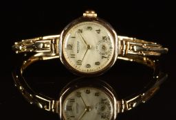 Rotary 9ct gold ladies wristwatch with subsidiary seconds dial, gold hands and Arabic numerals,