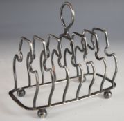 George V hallmarked silver seven bar toast rack, Sheffield 1925, maker James Deakin & Sons, length