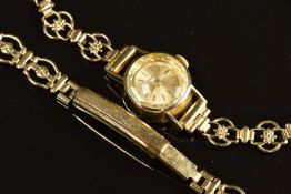 Tudor ladies wristwatch with gold hands and hour markers, champagne dial, gold plated case and