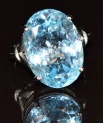 A 9k white gold ring set with an mixed oval cut topaz, 8.7g, size N