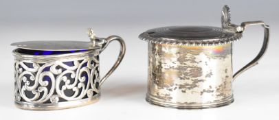 Two Georgian and Victorian hallmarked silver mustards, one with gadrooned edge and clear glass