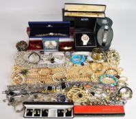 A collection of jewellery including beaded necklaces, bracelets, agate necklace with silver pendant,