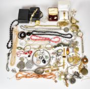 A collection of jewellery including pocket watches, agate necklace and a pendant, amber pendant,