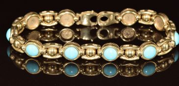 A 9ct gold bracelet set with faux turquoise, 15.5g, 19cm