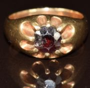 A 9ct gold ring set with a garnet, 7.5g, size P