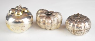 Three Chinese, Burmese or similar silver novelty gourd and fruit shaped trinket pots, the largest