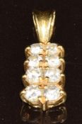 An 18ct gold pendant set with eight round cut diamonds, 1.7g, 1.7cm