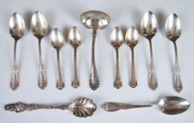 American silver cutlery to include an Art Nouveau sifter spoon, ladle and various teaspoons,