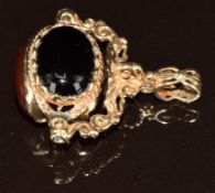 A 9ct gold swivel fob set with agate, onyx and tiger's eye, 7.5g
