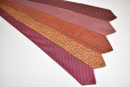 Five Hermès silk ties, one with pumpkin decoration