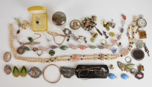 A collection of jewellery including silver pocket watch, silver coins in brooch mounts, gold ring