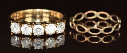 A 9ct gold ring set with cubic zirconia and another 9ct gold ring, 3g, size H & M