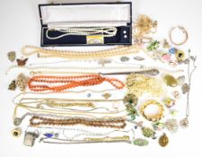 A collection of costume jewellery including a two strand cultured pearl necklace and earrings, two