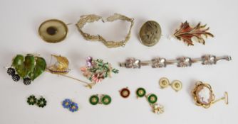 A collection of jewellery including silver bracelet with four leaf clover decoration, two