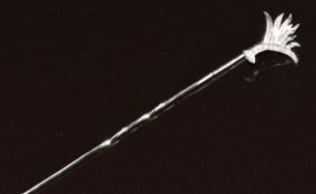 An 18ct white gold stick pin in the form of a leek (Welsh Guards) set with diamonds, 2g, 7cm