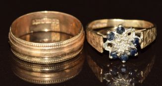 A 9ct gold ring set with a diamond and sapphires (missing two sapphires, size H) and a 9ct gold