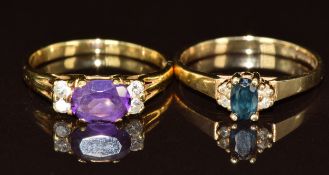 An 18ct gold ring set with an oval cut amethyst and four diamonds (2g, size J) and 10k 'Magic Glo'