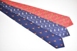 Three Hermès silk ties, decorated with pheasants, squirrels and birds
